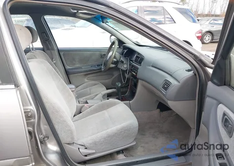 2001 Nissan Altima Gxe z USA, uszkodzony, nr VIN 1N4DL01D91C103045